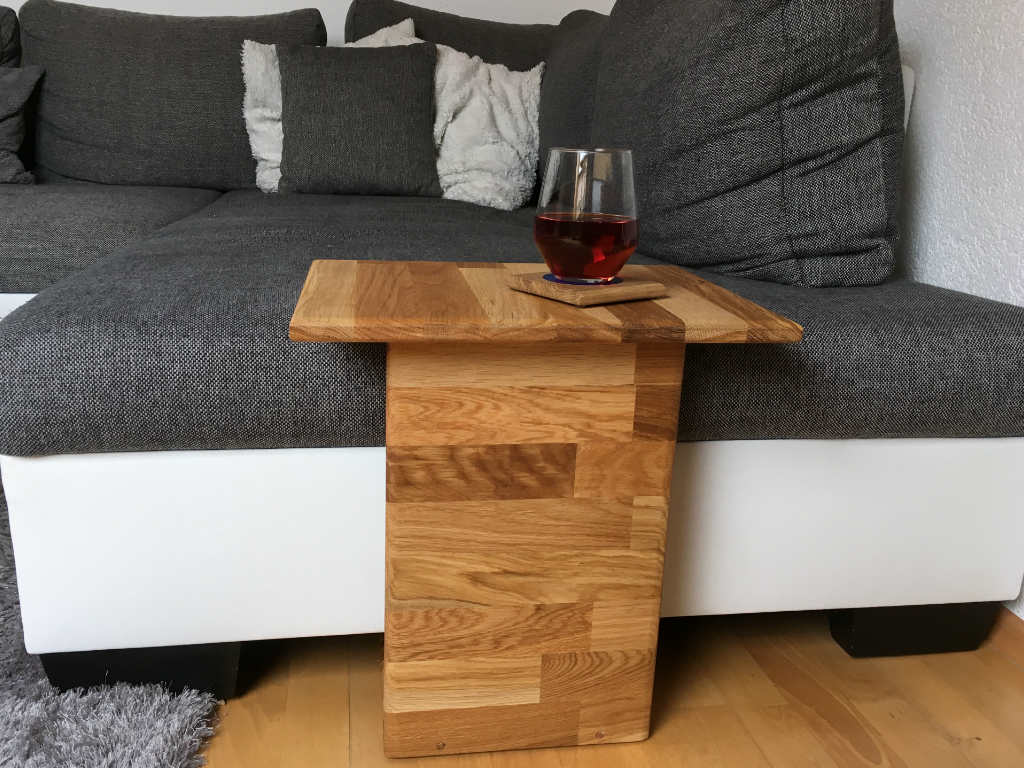 The finished coffee table on a sofa