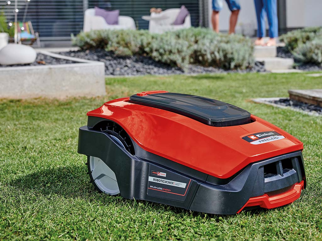 The robot lawn mover mows the lawn