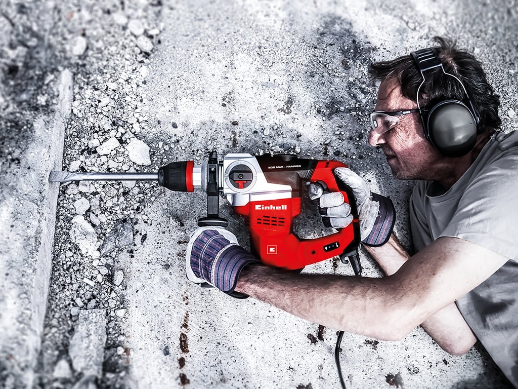 man using einhell rotary hammer